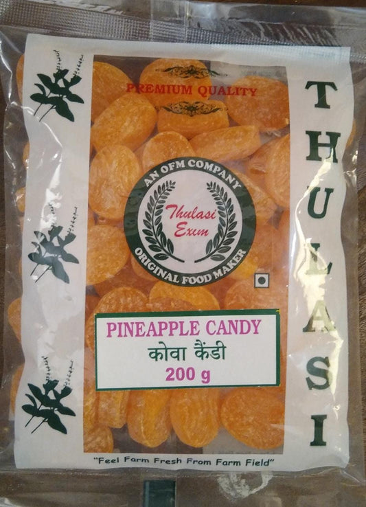 Packaged pineapple candy with Thulasir brand label on a clear background